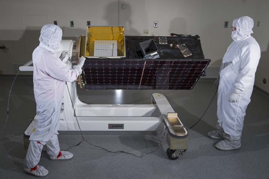 Engineers inspect SensorSat prior to thermal-vacuum testing.