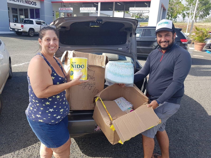 Puerto Rico residents receive donations of infant-care supplies.
