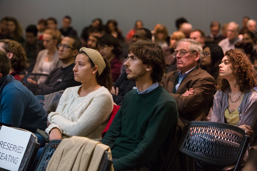 Audience members listen to Senator Sheldon Whitehouse, guest speaker at an MIT Environmental Solutions Initiative People and the Planet lecture.