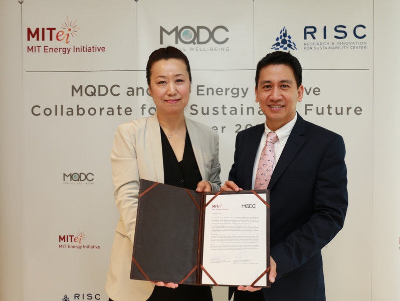 Lihong "Wendy" Duan, manager of the Asia Pacific Energy Partnership Program at the MIT Energy Initiative, and Singh Intrachooto, chief advisor of MQDC’s Research and Innovation for Sustainability Center, celebrate the launch of the MITEI-MQDC collaboration.