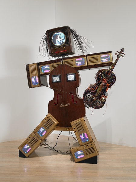 Nam June Paik: "Charlotte Moorman II, (1995)" (Nine antique TV cabinets, two cellos, one 13-in. color TV, two 5-in. color TVs, eight 9-in. color TVs, and two-channel video)