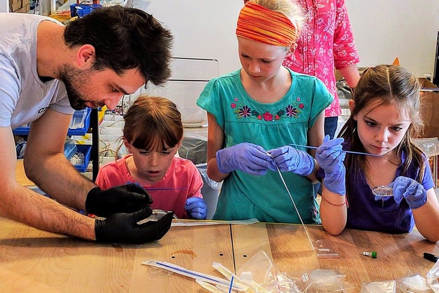 Amino has sold about 250 full kits, so far, to teachers and students, parents and children, museums, makers, artists, and researchers. The startup is also hoping to bring the kits to students in developing countries and to researchers that operate in areas without access to full biology labs. Pictured here, Amino co-founder Justin Pahara (left) teaches an Amino Labs workshop for home-schooled stud...