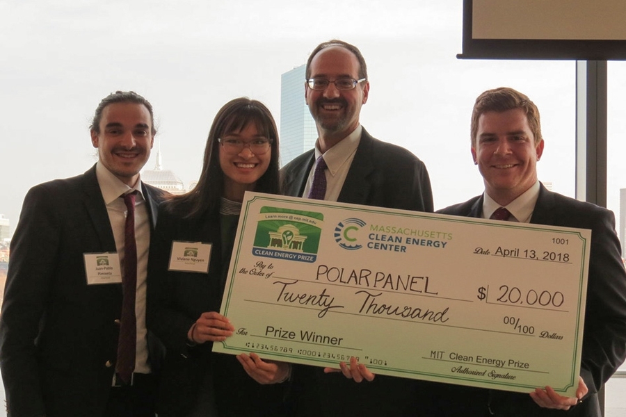 Second-place winner of $20,000, PolarPanel, a team from the University of Houston, stand with the event's other keynote speaker Tibor Toth (third from left), director of investments at the Massachusetts Clean Energy Center. 