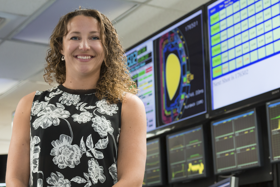 MIT postdoc Theresa Wilks enjoys time in the DIII-D control room, where she oversees experiments that provide insights about plasma turbulence in fusion tokamaks.