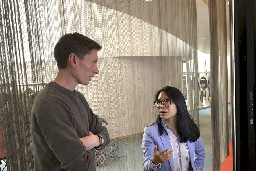 Postdoc Ruby Fu (right) presents her research during the electronic poster session at CEE Research Night on April 24.