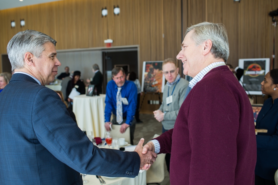Lincoln Laboratory Director Eric Evans (left) congratulates Lincoln Laboratory staff member William Zuk on his induction to the Quarter Century Club.