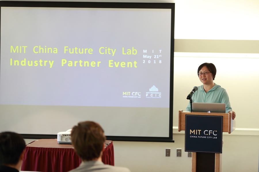 Faculty director Siqi Zheng speaks at the China Future City Lab industry partner demo day.