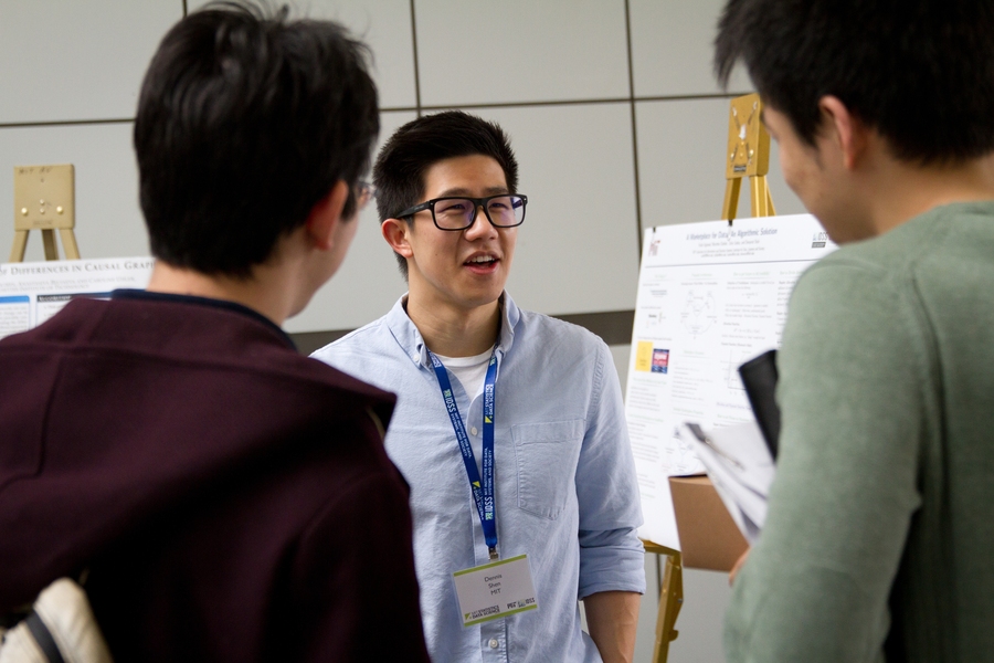 Dennis Shen, a graduate student with the Laboratory for Information and Decision Systems, was one of 18 MIT students who presented research during a poster session.