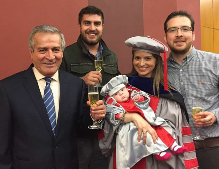 The Falla family celebrates Alejandra's graduation from MIT. Left to right: Luis H. Falla, Julian Falla, baby Clara, Alejandra Falla PhD '18, Andres Cubillos-Ruiz PhD '15. 