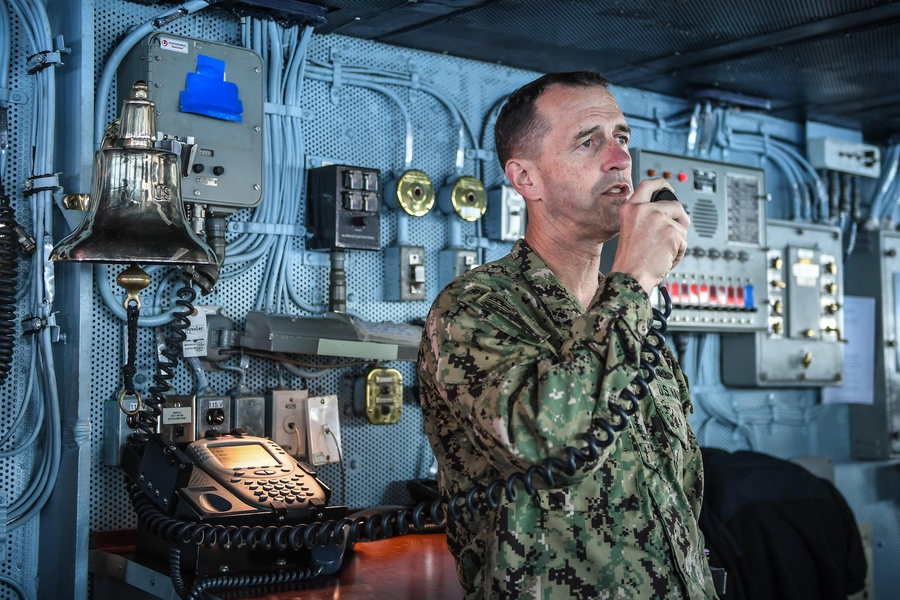 Chief of Naval Operations Admiral John Richardson SM ’89, EE ’89, ENG ’89, addresses the crew of the aircraft carrier USS Theodore Roosevelt in the Arabian Gulf. His position as chief of naval operations places him on the Joint Chiefs of Staff as adviser to the secretary of defense and the president.  
