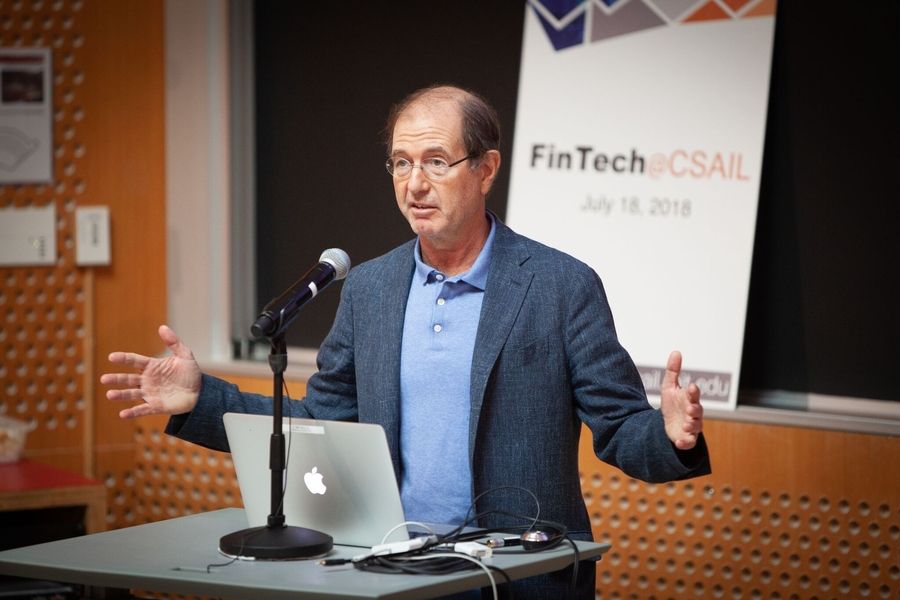 MIT professor Silvio Micali, one of the leaders of the new FinTech@CSAIL initiative, speaks to industry leaders at the Stata Center.
