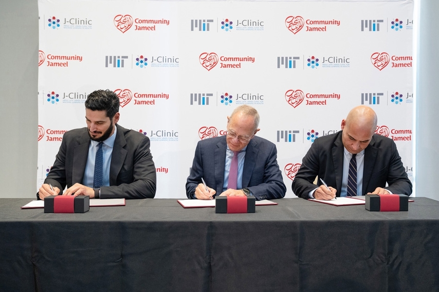 This morning’s ceremonial signing at the J-Clinic launch event. From left to right: Hassan Jameel, president of Community Jameel Saudi Arabia; L. Rafael Reif, president of MIT; Fady Jameel, president of Community Jameel International.