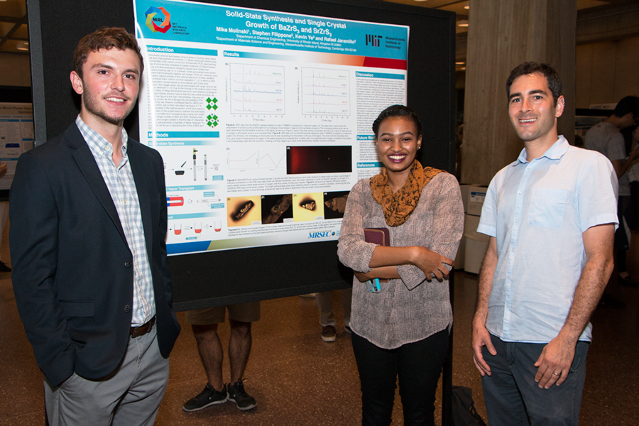Summer Scholar Michael Molinski [left] poses with his poster on solid-state electronic materials with summer research alumna Noon Farsab and assistant professor of materials science and engineering Rafael Jaramillo, in whose lab both interned. Molinski made powders of compounds such as barium zirconium sulfide, which are desirable for their optical and electrical properties. 