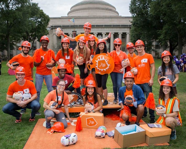 Members of Team Orange from last year’s class 2.009, Product Engineering Processes pose in Killian Court. This group of mechanical engineering seniors designed and developed a working prototype of Rhino for their group project.