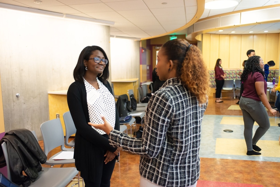 Participants in the ACCESS program get tips on presenting in an interactive communications workshop.