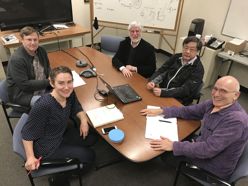 Gathered around the conference table are  (clockwise from front left) Research Scientist Maria Gatu Johnson, Senior Research Scientist Johan Frenje, Research Scientist Fredrick Seguin, Senior Research Scientist Chikang Li, and HEDP Division Head Richard Petrasso.