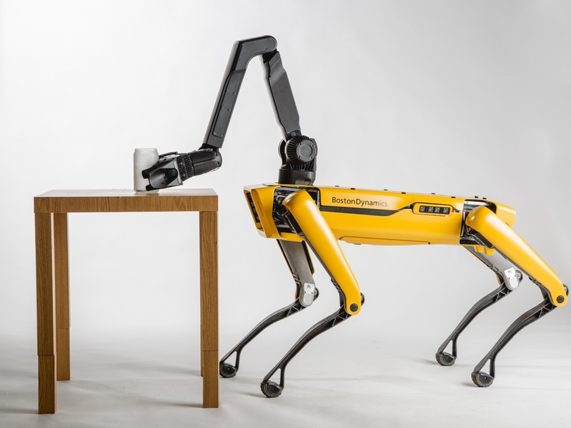 Boston Dynamics' SpotMini robot, which can climb stairs, open doors and pick up objects