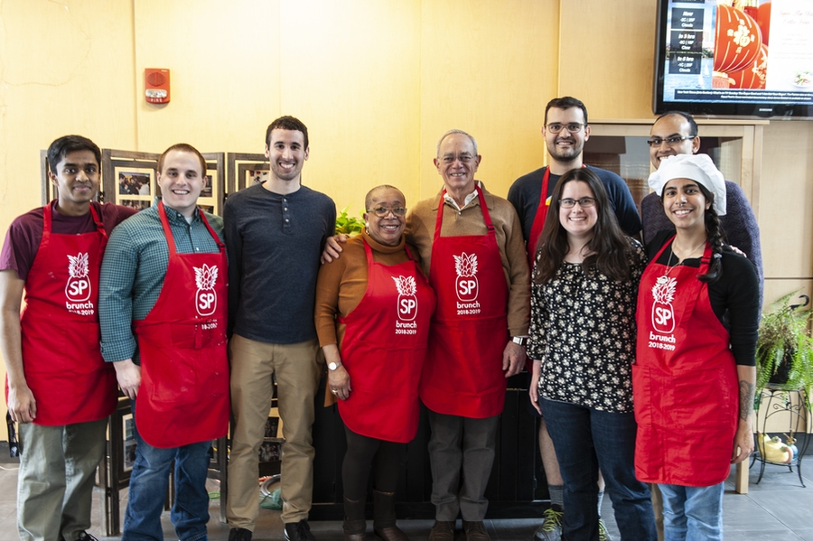 The Sidney-Pacific Executive Council and brunch chairs welcome President Reif and Dean Staton in the Sidney-Pacific lobby.