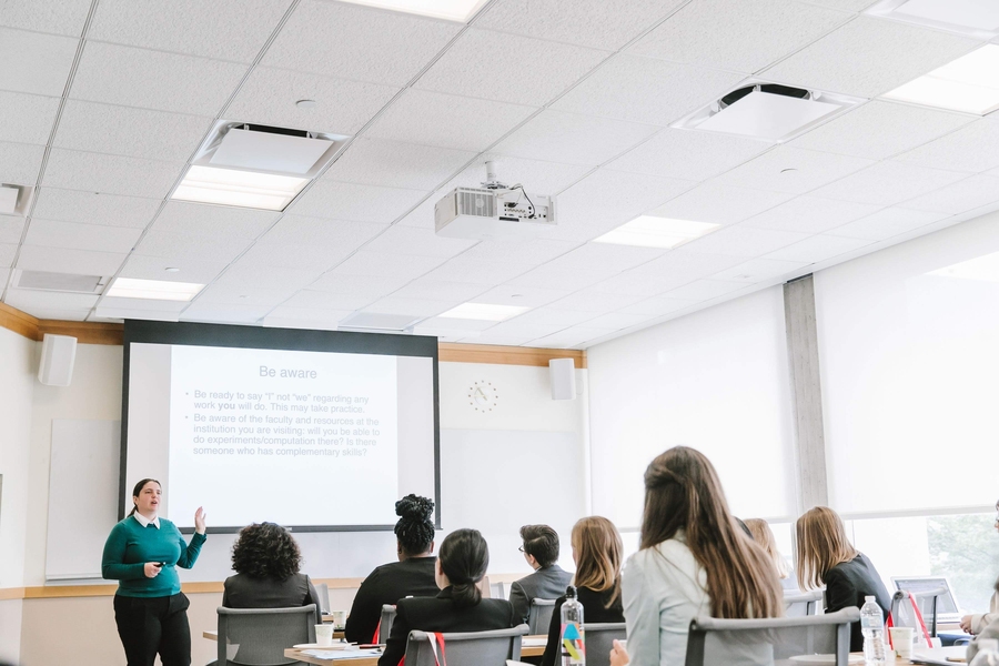 Professor Heather Kulik gives advice to workshop attendees