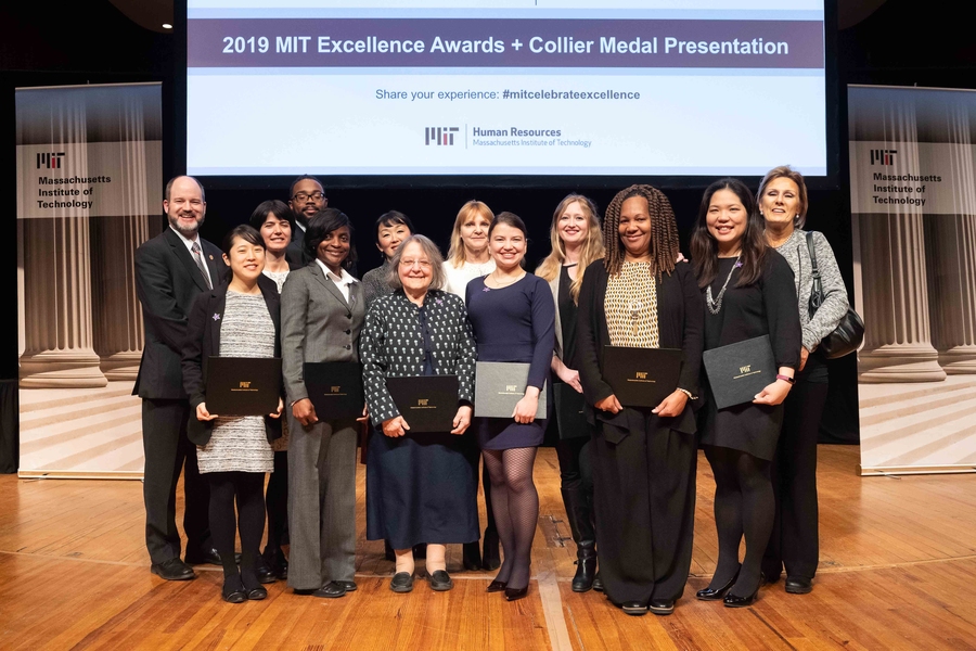 The International Students Office Team receives an award for Bringing out the Best.