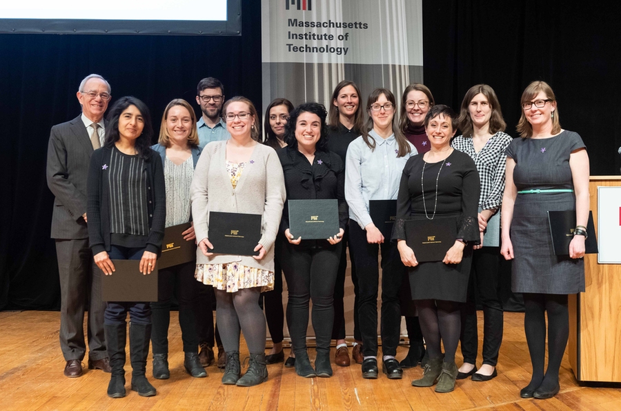 The MIT Press Diversity and Inclusion Working Group receives their award for Advancing Inclusion and Global Perspectives from President L. Rafael Reif.