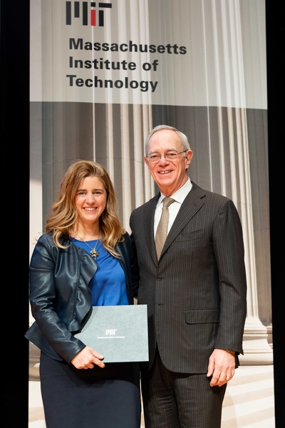Mercedes Balcells-Camps receives an award for Advancing Inclusion and Global Perspectives from President L. Rafael Reif.