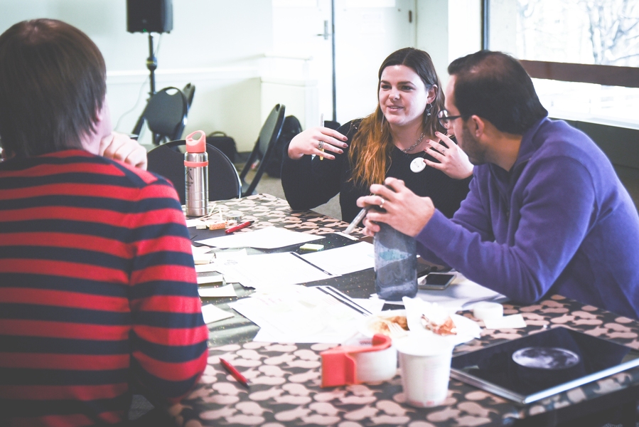 MIT senior Allison Shepard and representatives from the German manufacturing company Viessmann brainstorm potential energy solutions for Martha's Vineyard using the design thinking model.