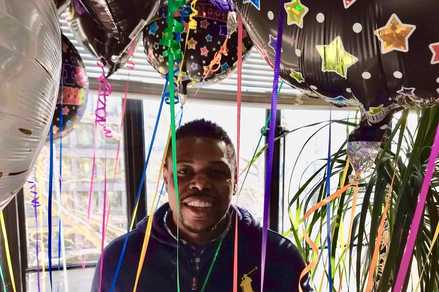 Mitch Moise of the Department of Chemistry handed out balloons to department members.