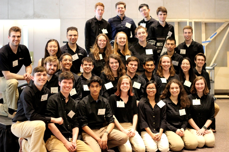 Members who were able to attend the unveiling assembled for a team photo at the end of the event.