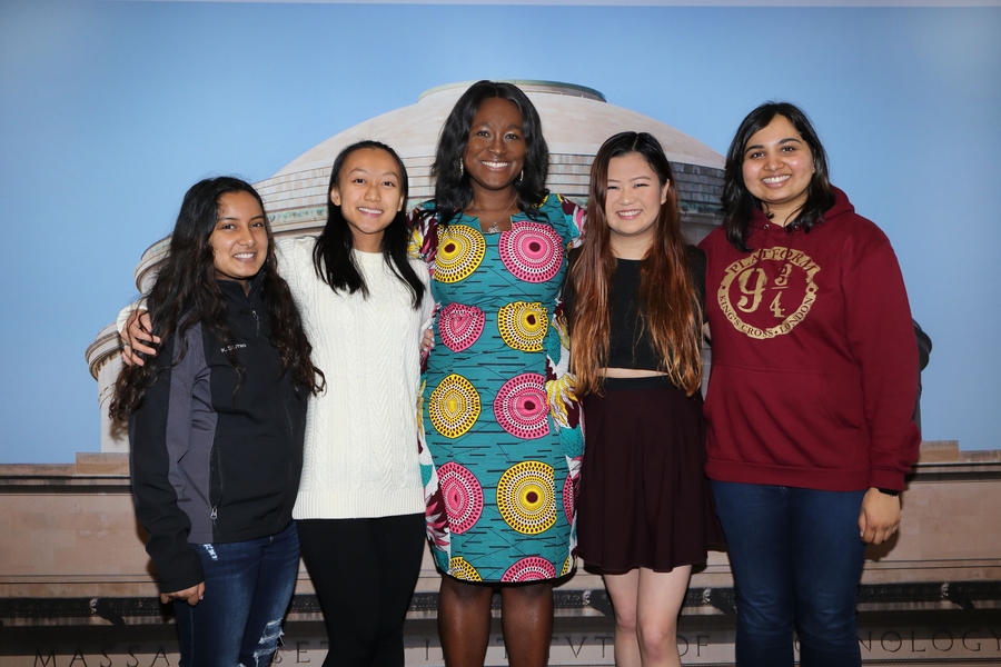 Jessica Quaye (center) stands with friends after receiving the Albert G. Hill Prize and Laya W. Wiesner Award at the 2019 Awards Convocation.