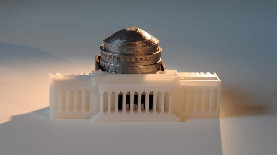 Each component of this three-piece assembly of MIT’s Building 10 dome was printed using a different commercial additive manufacturing process. The piece was modeled after an original design by Ely Sachs and Michael Cima after their invention of binder jet printing.