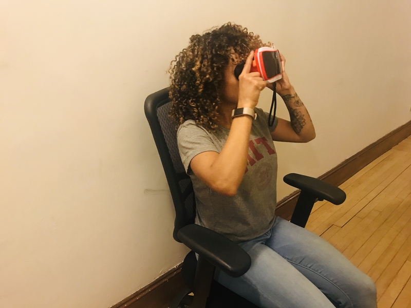 Danielle Olson, a PhD student in the Computer Science and Artificial Intelligence Laboratory (CSAIL) at MIT, holds a virtual reality headset.