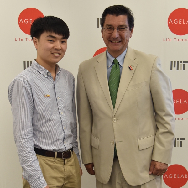 Jay Park (pictured, left) was one of three Boston-area high school students to receive a 2019 OMEGA scholarship, along with Sidonie Brown and Brook Masse. Park stands with AARP Massachusetts Director Michael Festa. 