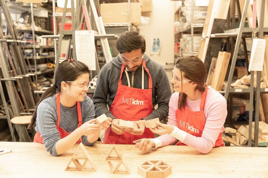 Left to right: Chinh Bui, Samip Jain, and Blanca Foncillas work together on their class project, Savor, a playful spice set that brings families and friends together at the dinner table.