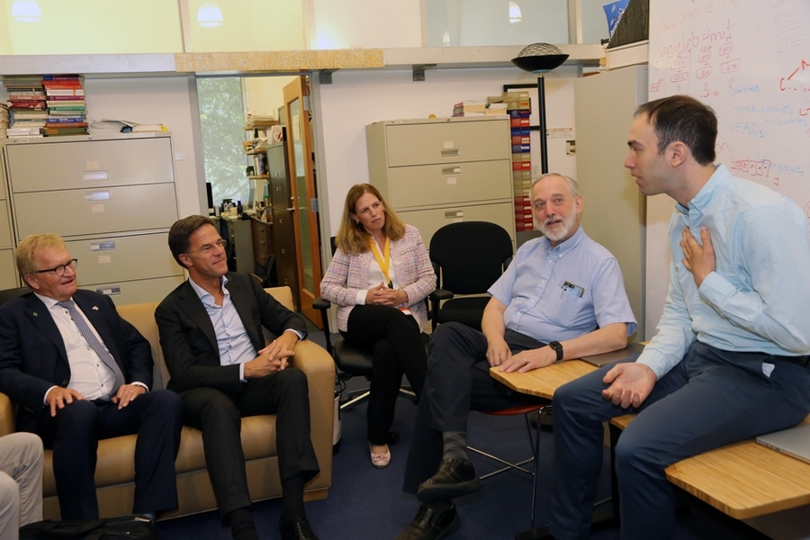 Prime Minister Mark Rutte of the Netherlands, seated at center, talks with MIT professors Peter Szolovits, second from right, and David Sontag, right, of the Clinical Decision-Making Group in CSAIL. With the prime minister are, from left, Hans de Boer, president of the Confederation of Netherlands Industry and Employers, and Anouschka Versleijen, innovation manager at TU Delft University.