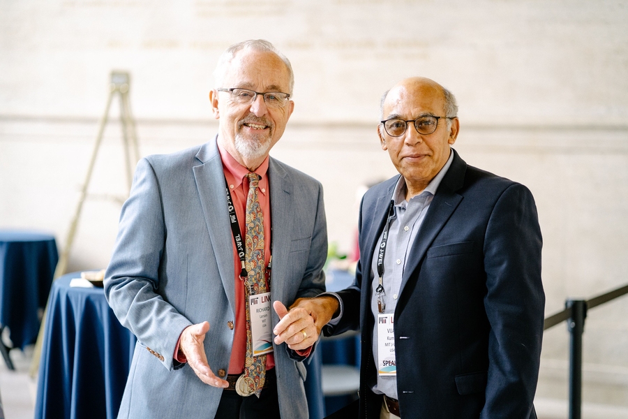 Richard Larson (left), principal investigator of BLOSSOMS and founding director of LINC, stands with Vijay Kumar, executive director of the Abdul Latif Jameel World Education Lab (J-WEL) and associate dean for open learning at MIT.