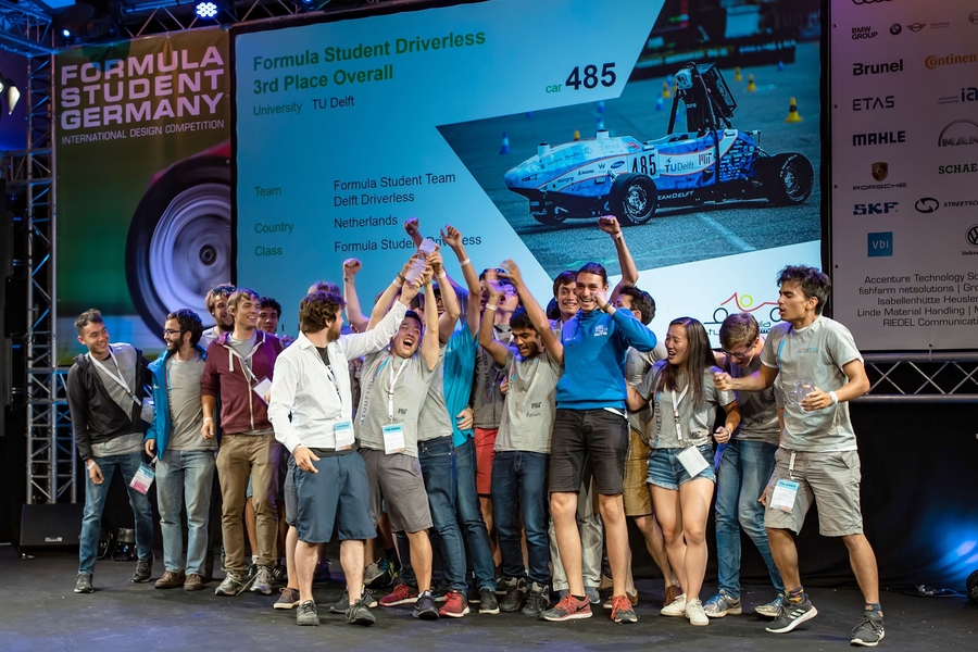 Students from the MIT Driverless and TU Delft team celebrated their third-place victory. Nine MIT students and 17 Delft students participated in the competition in Germany.