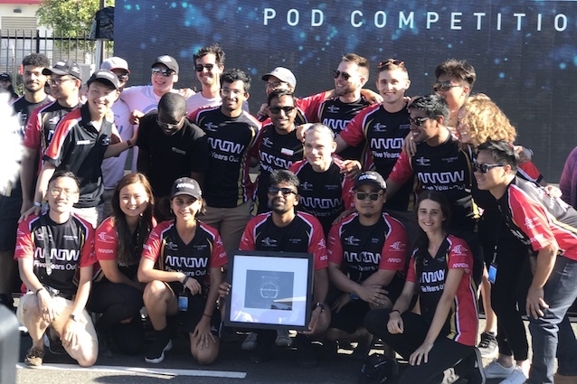 Hyperloop II holding their Innovation Award at the 2019 SpaceX Hyperloop Pod Competition.