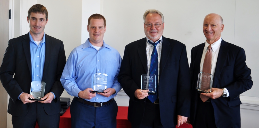 Lincoln Laboratory employees (left to right) William Moulder, Jayme Selinger, David Pronchick, and Jeffrey Herd accept the FLC Excellence in Technology Transfer Award.