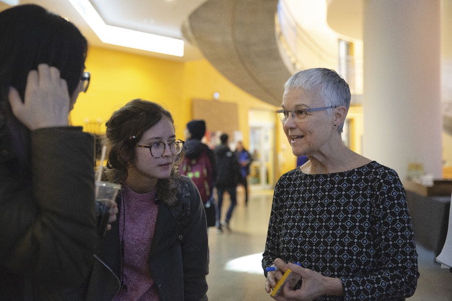 MindHandHeart Executive Administrator Maryanne Kirkbride (right) meets with students during the launch of the Schwarzman College of Computing to discuss the Department Support Project.