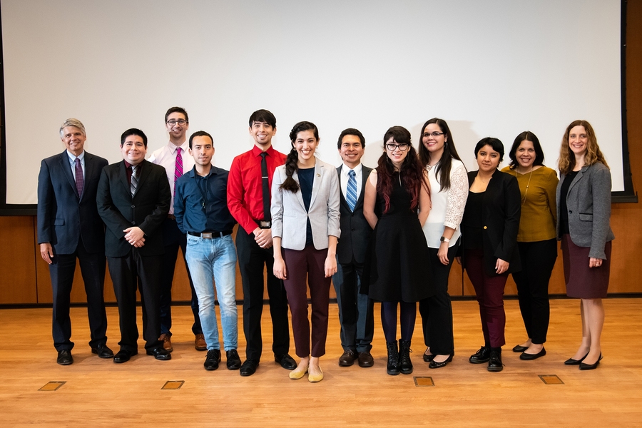 Members and supporters of Lincoln Laboratory's Hispanic/Latino Network gather with Natalia Guerrero (sixth from left) after her keynote address.