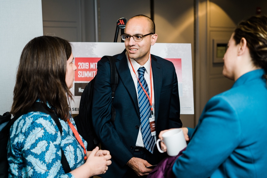 MIT SEII and MITili Co-Director Parag Pathak (center) speaks with unified enrollment experts Gabriela Fighetti of New Orleans and Catherine Peretti of Washington, D.C.