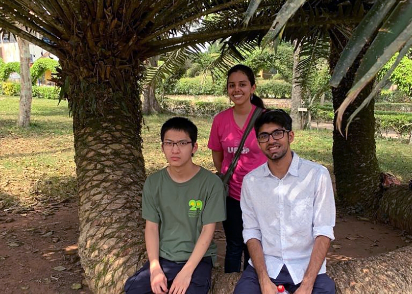 MIT mathematics students (l-r) Andrew Gu, Carolina Ortega, and Eshaan Nichani in Ghana during Independent Activities Period.