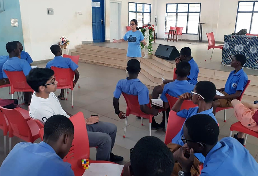 Carolina Ortega, a third-year mathematics student at MIT, talks with students as part of a MISTI-Africa program to connect MIT mathletes with their Ghanaian counterparts.