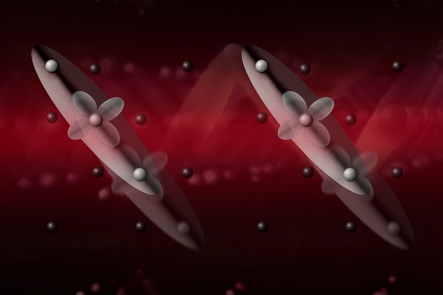 Researchers confirmed the existence of electronic waves that are frozen at a transition temperature of 125 kelvins and start “dancing together” in a collective oscillating motion as the temperature is lowered. In this illustration, a red laser beam triggers the dance of the newly discovered electronic waves in magnetite.