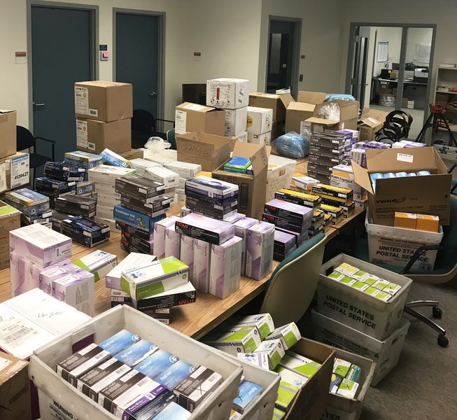 Donations from across campus are collected and sorted in MIT's Mail Services before distribution to area hospitals.