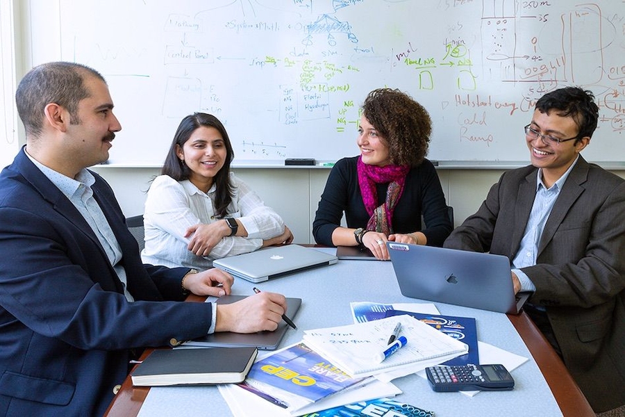 From left: Emre Gençer, a MITEI research scientist, is working with postdocs Naga Srujana Goteti, Maryam Arbabzadeh, and Tapajyoti Ghosh to expand MITEI’s new energy lifecycle assessment tool.