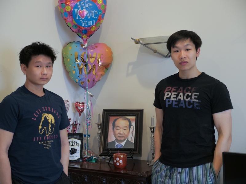 Steven Truong (right) and his younger brother commemorate their late father, who passed away a year and a half ago.