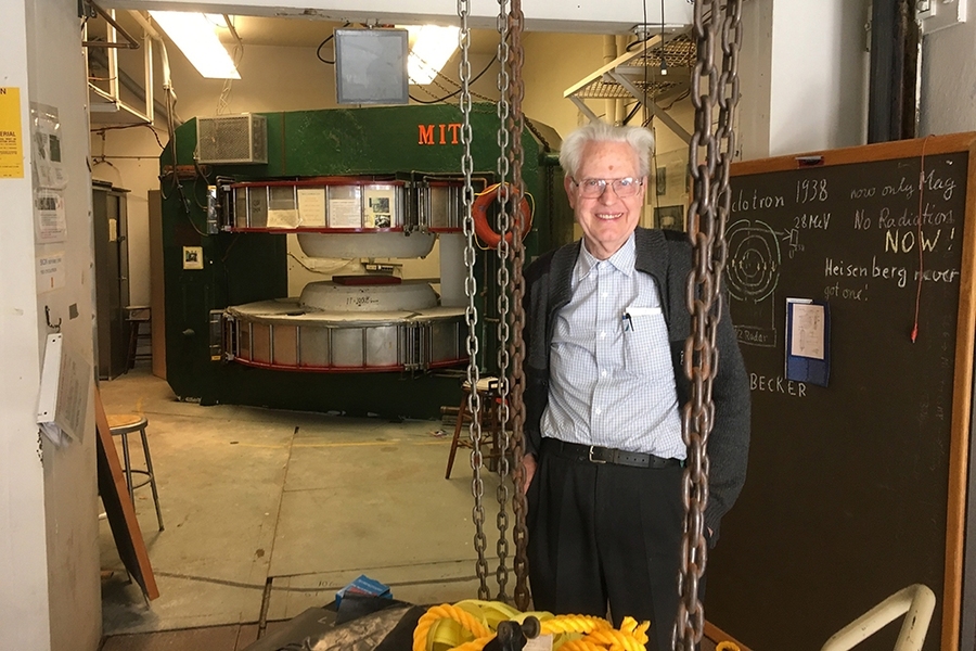 In the final days of cleaning out equipment before the demolition of Building 44, Ulrich Becker posed with the MIT Cyclotron.