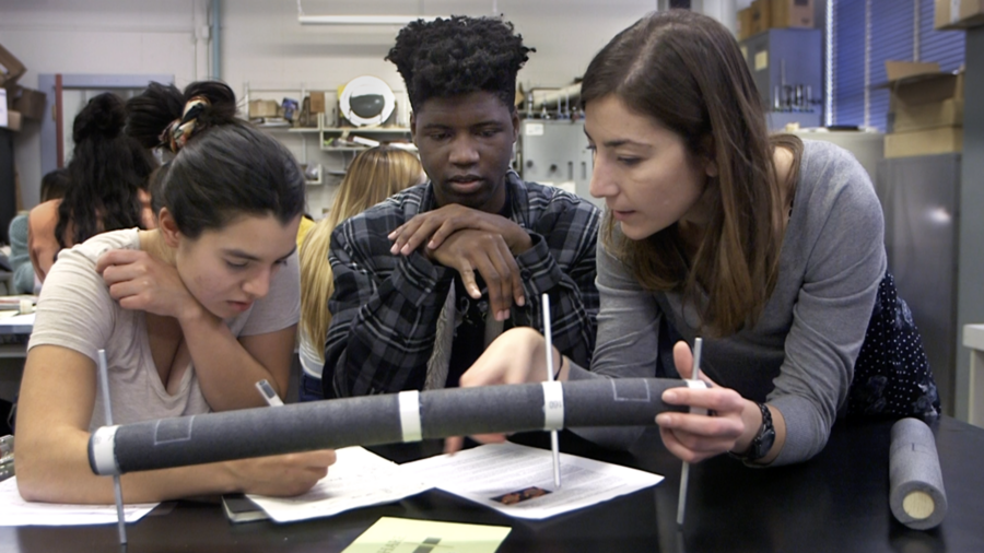 A goal of 2.001 Guided Discovery Labs is for students to rediscover foundational concepts of mechanics to instill deep understanding. Instructor Michela Geri (right) guides students Omoruyi Atheka (center) and Aline Vargas as they evaluate how their intuition of torsion measures up to their experimental results. 